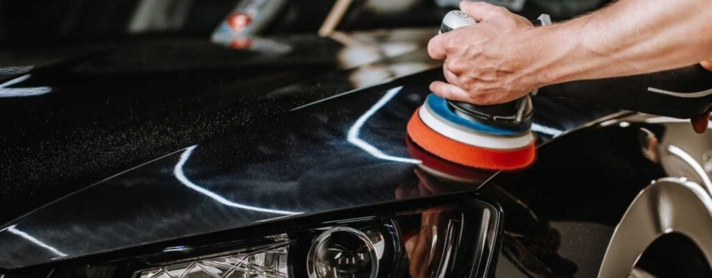 Worker repairing car